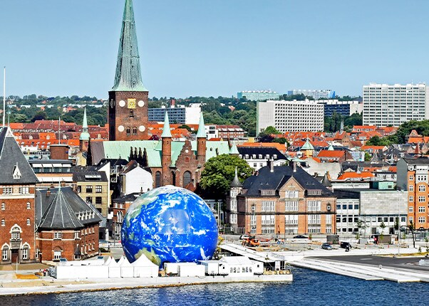 a giant globe of earth is located in the city of aarhus